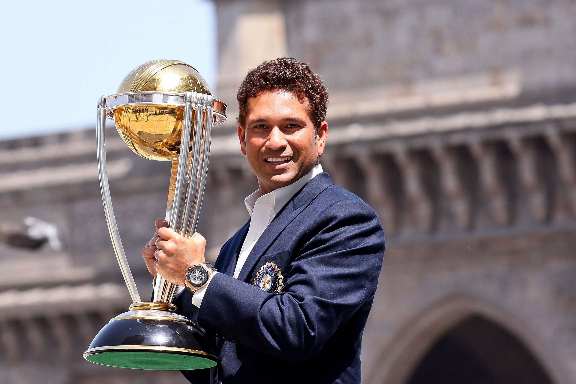 Sachin Tendulkar posing with the trophy after winning the 2011 ICC Cricket World Cup - Source: Getty